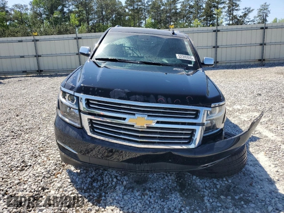 2018 Chevrolet Suburban Premier with VIN 1GNSCJKC1JR199271, listed as a Copart auction lot 52395935 with 216,083 mi miles and Salvage Title. Bid and sale history available at DreamBid. Image 5.