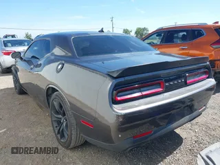 2017 Dodge Challenger R/T Plus with VIN 2C3CDZBT8HH600032, listed as a IAAI auction lot 42173591 with 92,303 mi miles and . Bid and sale history available at DreamBid. Image 3.
