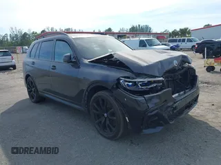 2022 BMW X7 M50i z VIN 5UXCX6C08N9M15818, wystawiony jako IAAI lot #41434065 z przebiegiem 52 740 mil mil oraz . Historia ofert i sprzedaży dostępna na DreamBid. Obrazek 1.