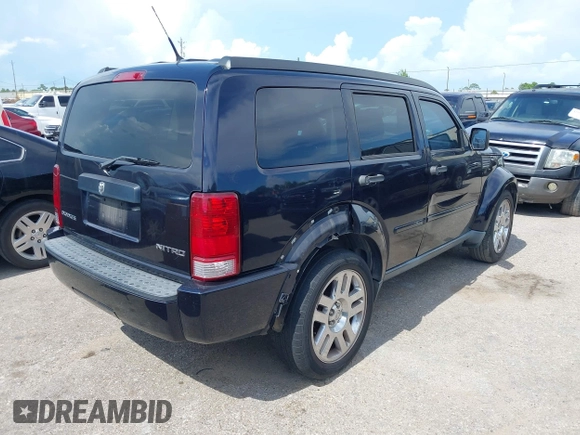 2011 Dodge Nitro Heat with VIN 1D4PT4GK1BW563775, listed as a IAAI auction lot 42573092 with 125,280 mi miles and . Bid and sale history available at DreamBid. Image 4.
