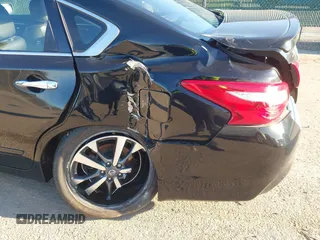2016 Nissan Altima SR with VIN 1N4AL3AP7GC212210, listed as a IAAI auction lot 41923139 with 26,433 mi miles and . Bid and sale history available at carsss.com. Image 6.