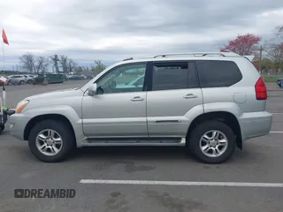 2004 Lexus GX with VIN JTJBT20X240063922, listed as a IAAI auction lot 42087170 with 251,366 mi miles. Bid and sale history available at carsss.com. Image 14.
