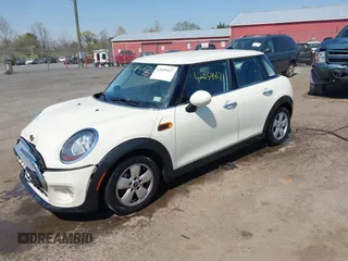 2015 MINI Hardtop 4 Door with VIN WMWXS5C53FT832742, listed as a IAAI auction lot 42059417 with 114,671 mi miles and . Bid and sale history available at DreamBid. Image 17.
