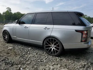2014 Land Rover Range Rover HSE with VIN SALGS2WF1EA164710, listed as a Copart auction lot 59882265 with 138,163 mi miles and Salvage title. Bid and sale history available at DreamBid. Image 2.