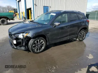 2016 Mazda CX-5 Grand Touring with VIN JM3KE4DY0G0679190, listed as a Copart auction lot 53619495 with 154,649 mi miles and Salvage Title. Bid and sale history available at carsss.com. Image 1.