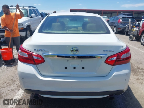 2016 Nissan Altima SL with VIN 1N4BL3AP1GC129036, listed as a IAAI auction lot 42274026 with 125,865 mi miles and . Bid and sale history available at DreamBid. Image 16.