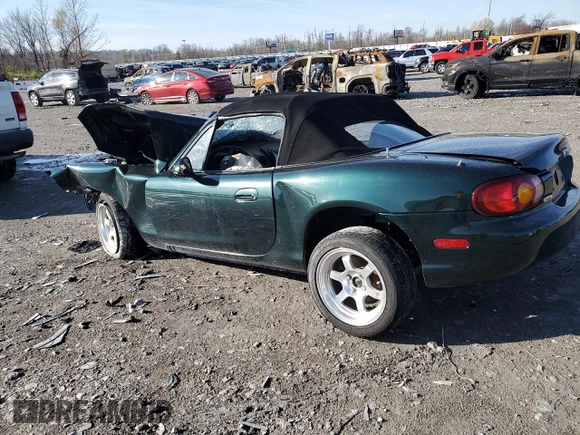 1999 Mazda MX-5 Miata z VIN JM1NB3536X0133733, wystawiony jako Copart lot #50906215 z przebiegiem Nie podano mil oraz Szkoda całkowita • Salvage title. Historia ofert i sprzedaży dostępna na DreamBid. Obrazek 2.