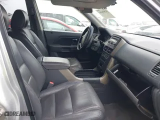 2006 Honda Pilot EX-L with RES with VIN 5FNYF286X6B043597, listed as a IAAI auction lot 41940460 with 325,118 mi miles. Bid and sale history available at carsss.com. Image 5.