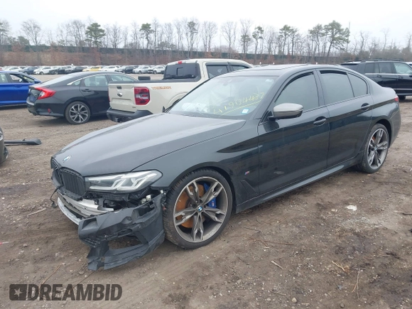 2022 BMW 5 Series M550i xDrive z VIN WBA13BK01NCH76521, wystawiony jako IAAI lot #41904437 z przebiegiem Nie podano mil oraz . Historia ofert i sprzedaży dostępna na DreamBid. Obrazek 21.