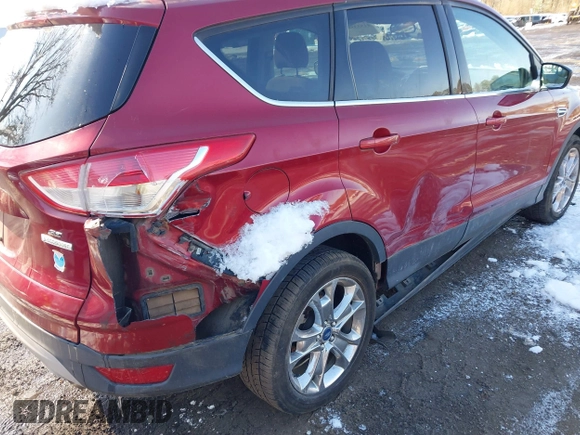 2014 Ford Escape SE with VIN 1FMCU0GX6EUA57609, listed as a IAAI auction lot 41533589 with 96,709 mi miles. Bid and sale history available at carsss.com. Image 6.