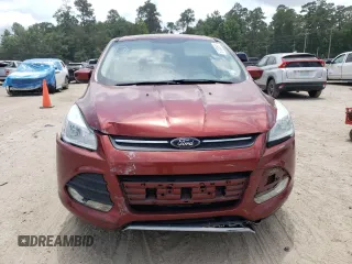 2014 Ford Escape SE z VIN 1FMCU0GX6EUA02674, wystawiony jako Copart lot #57833695 z przebiegiem 61 872 mil mil oraz Szkoda całkowita • Salvage title. Historia ofert i sprzedaży dostępna na DreamBid. Obrazek 5.