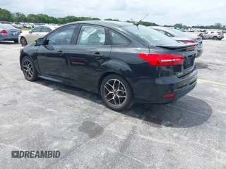 2015 Ford Focus SE with VIN 1FADP3F21FL209221, listed as a IAAI auction lot 42716293 with 100,465 mi miles and . Bid and sale history available at DreamBid. Image 3.