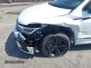 2024 Volkswagen Tiguan SE R-Line Black with VIN 3VVCB7AX7RM085619, listed as a IAAI auction lot 42325566 with 10,615 mi miles and . Bid and sale history available at DreamBid. Image 6.