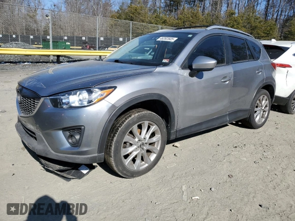 2015 Mazda CX-5 Grand Touring with VIN JM3KE4DY5F0460465, listed as a Copart auction lot 46392605 with 103,185 mi miles and Salvage Title. Bid and sale history available at carsss.com. Image 1.