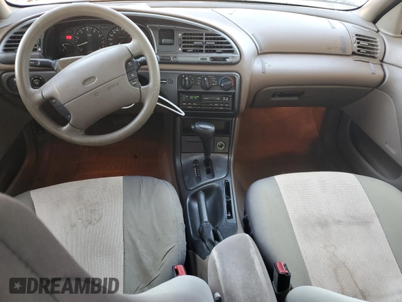 1996 Ford Contour z VIN 1FALP65L3TK117309, wystawiony jako Copart lot #88454995 z przebiegiem 100 401 mil mil oraz Czysty tytuł • Clean title. Historia ofert i sprzedaży dostępna na DreamBid. Obrazek 8.