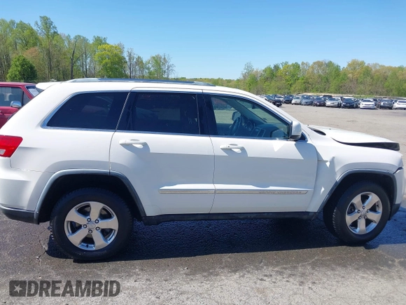 2011 Jeep Grand Cherokee Laredo with VIN 1J4RR4GG3BC736370, listed as a IAAI auction lot 42053862 with 169,269 mi miles and . Bid and sale history available at DreamBid. Image 13.