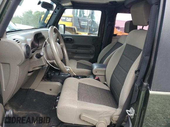 2008 Jeep Wrangler X with VIN 1J4FA24188L638183, listed as a Copart auction lot 56112955 with 112,438 mi miles and Salvage title. Bid and sale history available at DreamBid. Image 7.