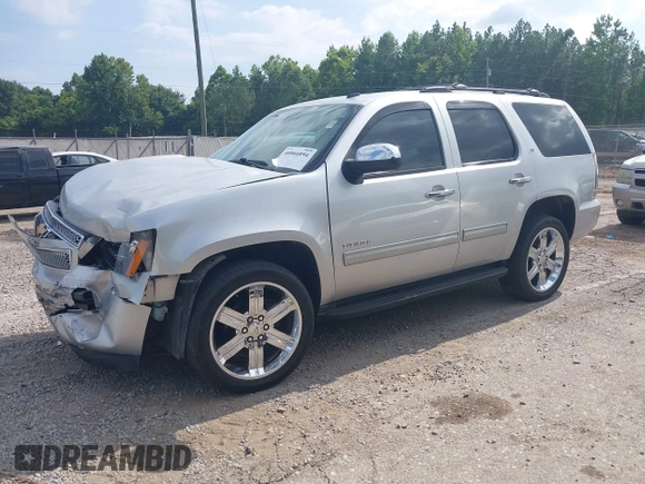 2012 Chevrolet Tahoe LT with VIN 1GNSKBE03CR124911, listed as a IAAI auction lot 40066894 with 151,551 mi miles and . Bid and sale history available at DreamBid. Image 2.