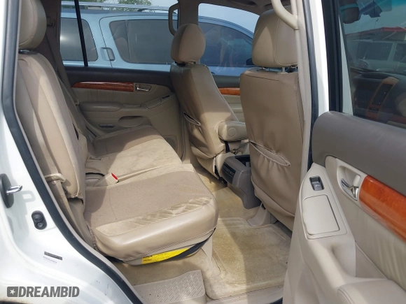 2007 Lexus GX 470 with VIN JTJBT20X570148905, listed as a IAAI auction lot 42025227 with 293,379 mi miles. Bid and sale history available at carsss.com. Image 8.