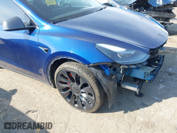 2022 Tesla Model Y Performance with VIN 7SAYGDEF7NF497076, listed as a IAAI auction lot 41759793 with 46,970 mi miles and . Bid and sale history available at DreamBid. Image 17.