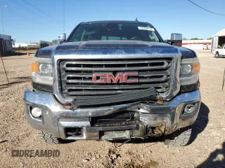 2015 GMC Sierra 2500HD SLT with VIN 1GT12ZEG8FF552439, listed as a Copart auction lot 72850724 with 147,888 mi miles and Salvage title. Bid and sale history available at DreamBid. Image 5.