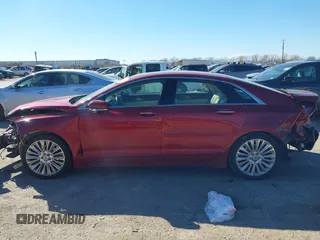 2015 Lincoln MKZ with VIN 3LN6L2G92FR619379, listed as a IAAI auction lot 41637555 with 147,343 mi miles. Bid and sale history available at carsss.com. Image 13.