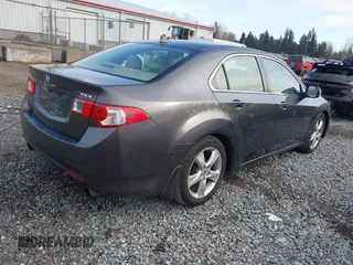 2009 Acura TSX with VIN JH4CU26689C029183, listed as a IAAI auction lot 41752509 with 169,872 mi miles. Bid and sale history available at carsss.com. Image 4.