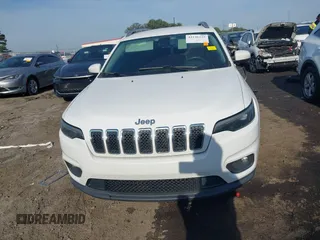 2019 Jeep Cherokee Latitude Plus z VIN 1C4PJLLBXKD308346, wystawiony jako IAAI lot #42146125 z przebiegiem 94 066 mil mil oraz . Historia ofert i sprzedaży dostępna na DreamBid. Obrazek 13.