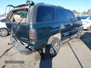 2002 Chevrolet Tahoe LS with VIN 1GNEC13T12R134174, listed as a IAAI auction lot 41233999 with 235,892 mi miles. Bid and sale history available at carsss.com. Image 4.