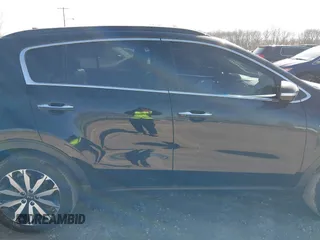 2018 Kia Sportage EX with VIN KNDPNCAC9J7324292, listed as a IAAI auction lot 41859338 with 124,519 mi miles and . Bid and sale history available at carsss.com. Image 13.