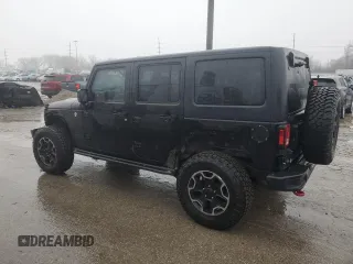 2016 Jeep Wrangler Unlimited Rubicon Hard Rock with VIN 1C4HJWFGXGL282521, listed as a Copart auction lot 43128545 with 123,074 mi miles and Salvage Title. Bid and sale history available at carsss.com. Image 2.