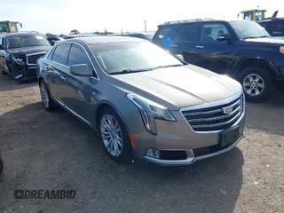 2019 Cadillac XTS Luxury with VIN 2G61M5S35K9125097, listed as a IAAI auction lot 41749076 with 102,585 mi miles and . Bid and sale history available at carsss.com. Image 1.