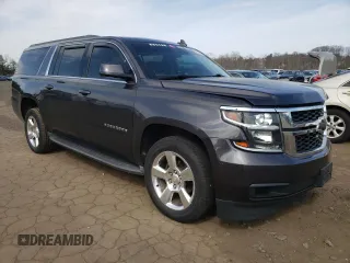 2016 Chevrolet Suburban LT with VIN 1GNSKHKC8GR107397, listed as a Copart auction lot 51874705 with 137,916 mi miles and Salvage Title. Bid and sale history available at DreamBid. Image 4.