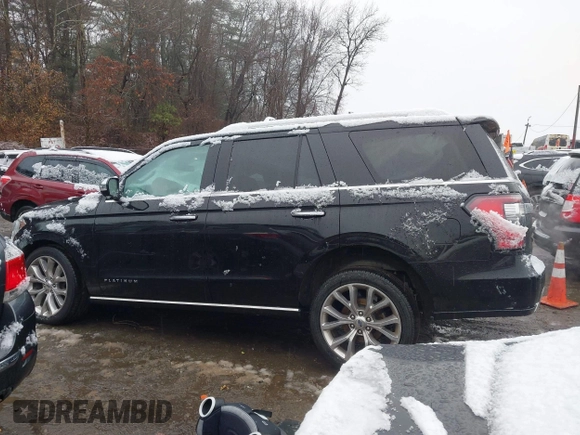 2019 Ford Expedition Platinum with VIN 1FMJU1MT5KEA25576, listed as a IAAI auction lot 40991021 with 44,446 mi miles. Bid and sale history available at carsss.com. Image 14.