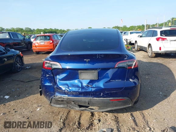 2023 Tesla Model Y Long Range with VIN 7SAYGDEE0PF671726, listed as a IAAI auction lot 42393616 with Not provided miles and . Bid and sale history available at DreamBid. Image 16.