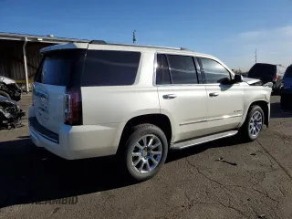 2015 GMC Yukon Denali with VIN 1GKS2CKJ7FR183710, listed as a Copart auction lot 49074135 with 230,526 mi miles and Salvage Title. Bid and sale history available at carsss.com. Image 3.