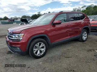 2018 Volkswagen Atlas SE with VIN 1V2CR2CAXJC581959, listed as a Copart auction lot 56651595 with 82,241 mi miles and Salvage title. Bid and sale history available at DreamBid. Image 1.