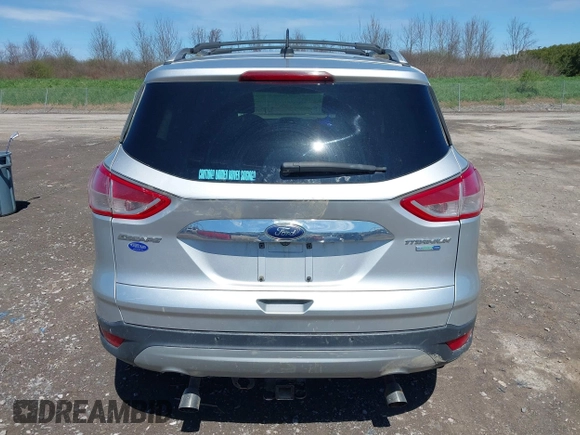 2016 Ford Escape Titanium with VIN 1FMCU9JX6GUB80715, listed as a IAAI auction lot 42060305 with 132,951 mi miles and . Bid and sale history available at DreamBid. Image 16.
