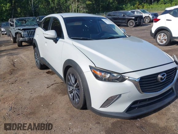 2018 Mazda CX-3 Touring with VIN JM1DKDC73J0319938, listed as a IAAI auction lot 39861564 with 117,199 mi miles. Bid and sale history available at carsss.com. Image 1.