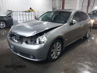 2006 Infiniti M z VIN JNKAY01E76M109160, wystawiony jako IAAI lot #41252984 z przebiegiem 134 744 mil mil oraz . Historia ofert i sprzedaży dostępna na DreamBid. Obrazek 17.