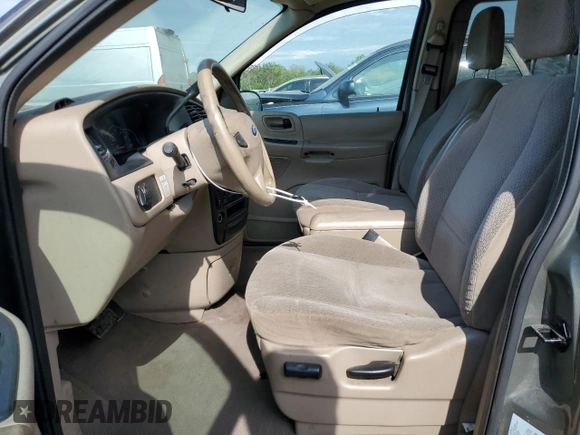 2003 Ford Windstar LX with VIN 2FMZA51413BB77562, listed as a Copart auction lot 56861095 with 170,562 mi miles and Salvage title. Bid and sale history available at DreamBid. Image 7.