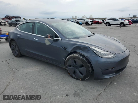 2020 Tesla Model 3 Standard Range Plus z VIN 5YJ3E1EA1LF784832, wystawiony jako Copart lot #57912995 z przebiegiem 77 665 mil mil oraz Szkoda całkowita • Salvage title. Historia ofert i sprzedaży dostępna na DreamBid. Obrazek 4.