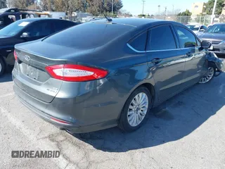 2015 Ford Fusion SE Hybrid with VIN 3FA6P0LU4FR306928, listed as a IAAI auction lot 41826720 with 83,983 mi miles. Bid and sale history available at carsss.com. Image 4.