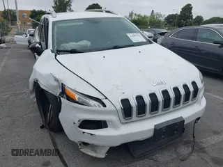 2016 Jeep Cherokee Limited with VIN 1C4PJLDB3GW165217, listed as a IAAI auction lot 42207091 with 102,328 mi miles and . Bid and sale history available at DreamBid. Image 6.