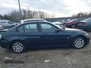 2006 BMW 3 Series 325xi with VIN WBAVD13516KT79513, listed as a IAAI auction lot 41609704 with 116,883 mi miles. Bid and sale history available at carsss.com. Image 13.