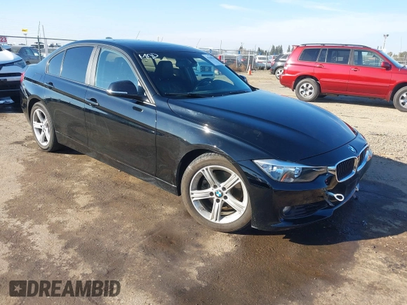 2014 BMW 3 Series 328i with VIN WBA3C1C55EK117180, listed as a IAAI auction lot 41389969 with 163,760 mi miles. Bid and sale history available at carsss.com. Image 1.