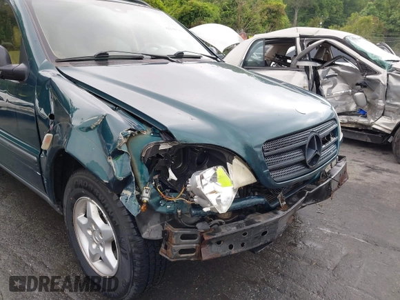 1998 Mercedes-Benz M 320/430/500 z VIN 4JGAB54E5WA006036, wystawiony jako IAAI lot #42230324 z przebiegiem 301 386 mil mil oraz . Historia ofert i sprzedaży dostępna na DreamBid. Obrazek 6.