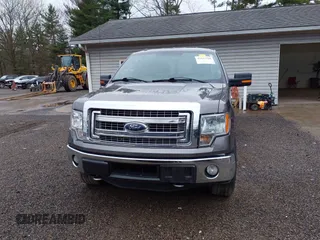 2014 Ford F-150 XL with VIN 1FTFW1ET8EFB75196, listed as a IAAI auction lot 41945260 with 319,194 mi miles. Bid and sale history available at carsss.com. Image 12.