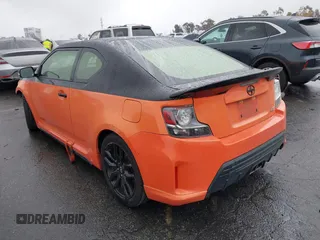 2015 Scion tC with VIN JTKJF5C79FJ007842, listed as a IAAI auction lot 41560881 with 155,436 mi miles. Bid and sale history available at carsss.com. Image 3.