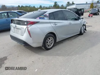 2016 Toyota Prius Two with VIN JTDKBRFUXG3023523, listed as a IAAI auction lot 41757143 with 124,144 mi miles. Bid and sale history available at carsss.com. Image 4.